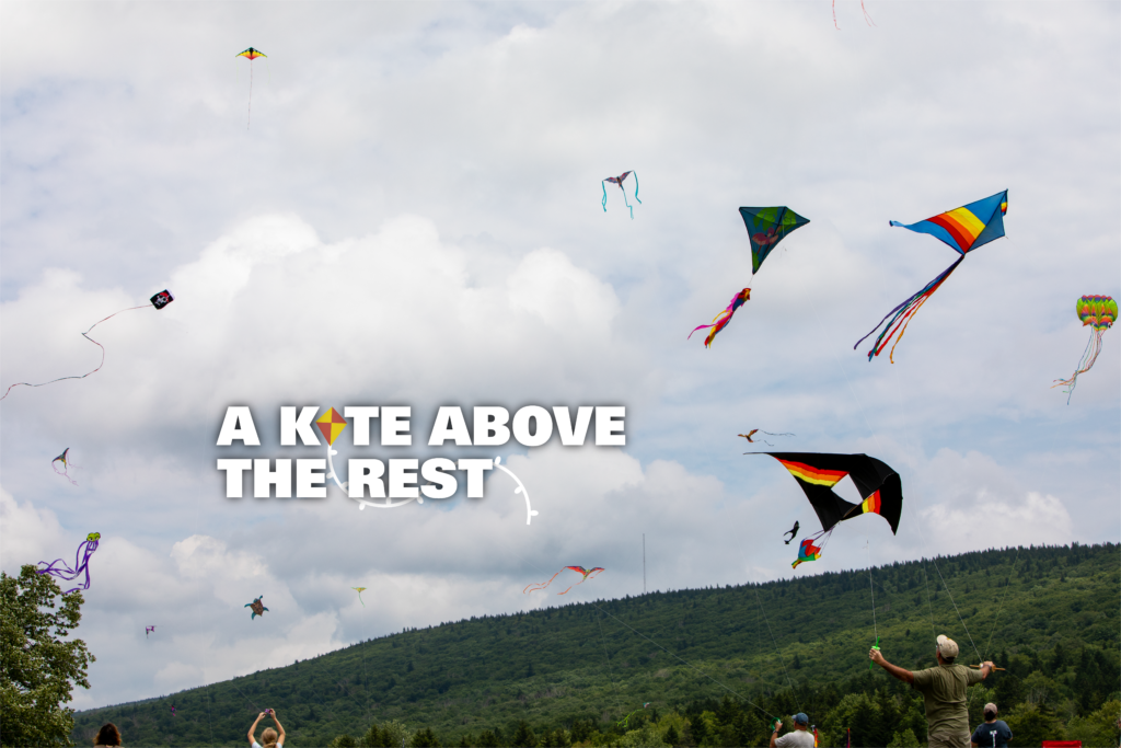 Title text "A Kite Above the Rest" on a background of dozens of kites in the sky.