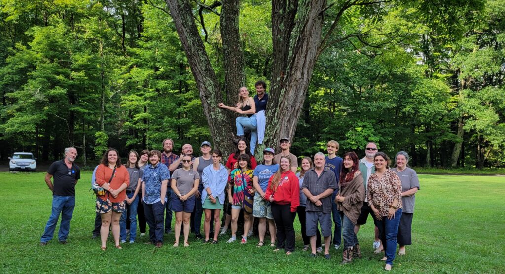 AmeriCorps Group photo by tree at Monongahela National Forest's Stuart Park Recreation Area